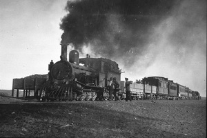 5.1925,Central Australia Railway NFB class loco on Ghan - William Creek - the sleeping car is most likely SAR car Nilpena