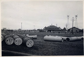 1954 - General view of drums dumped in Maree rail yard